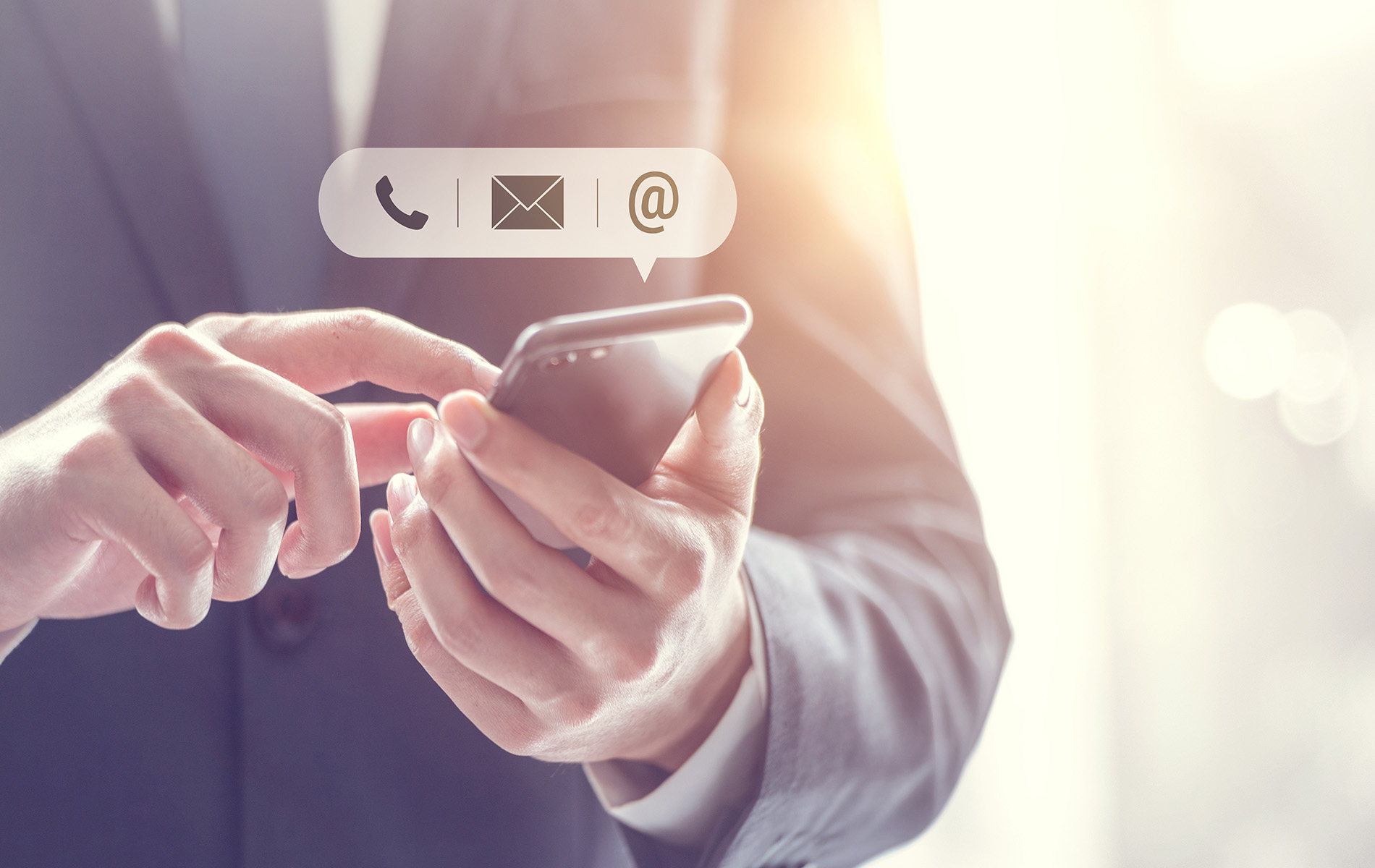 The image shows a hand holding a smartphone with a social media interface displayed, featuring a profile picture of a person and the option to Call or Message them.